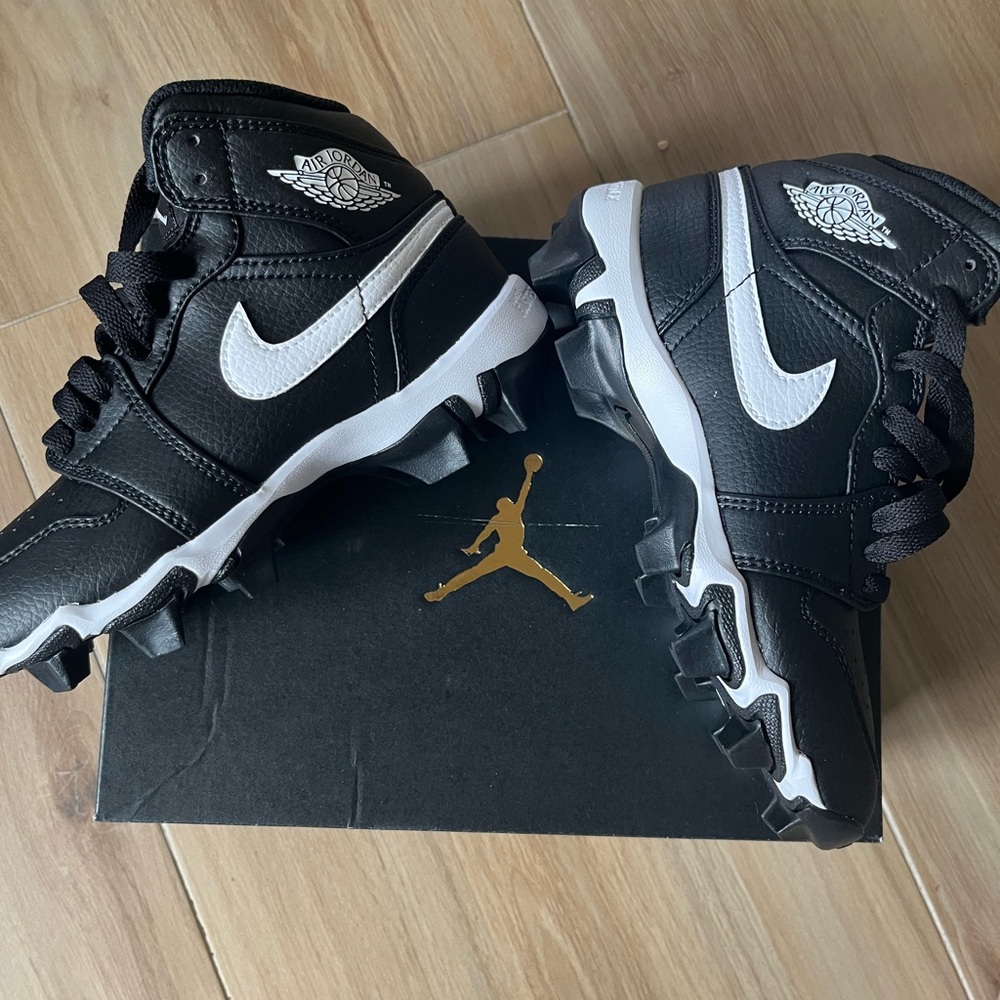 Jordan 1 mid multi sport cleats kids size 2.  New in box
